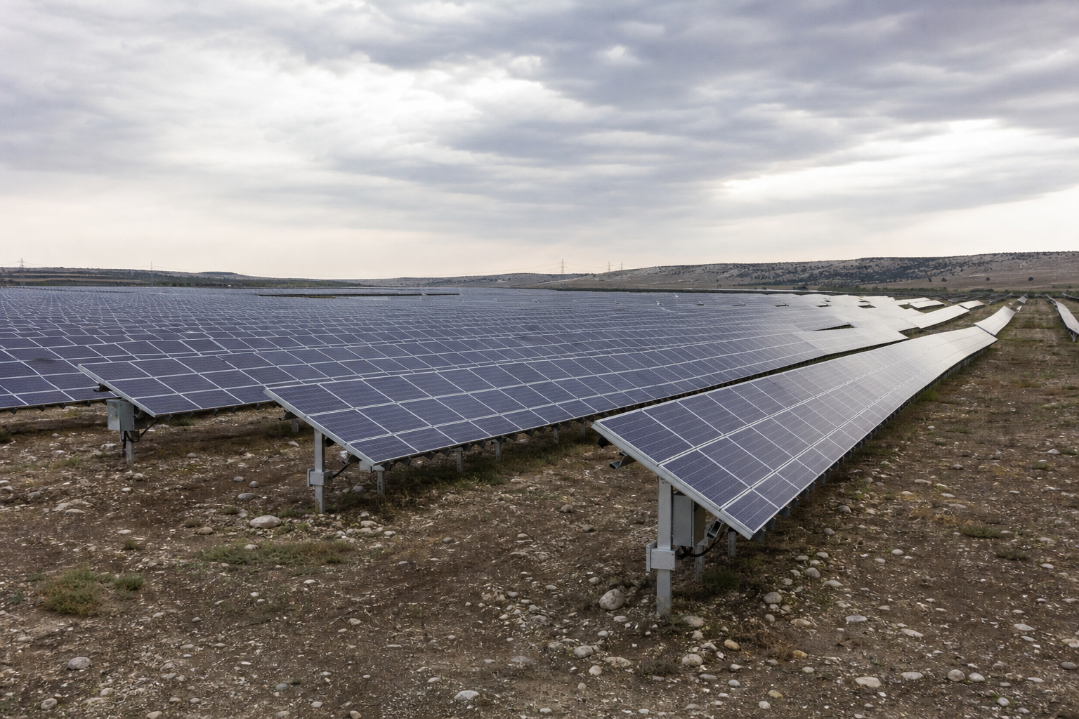 Industrial solar farm with rows of ground-mounted panels
